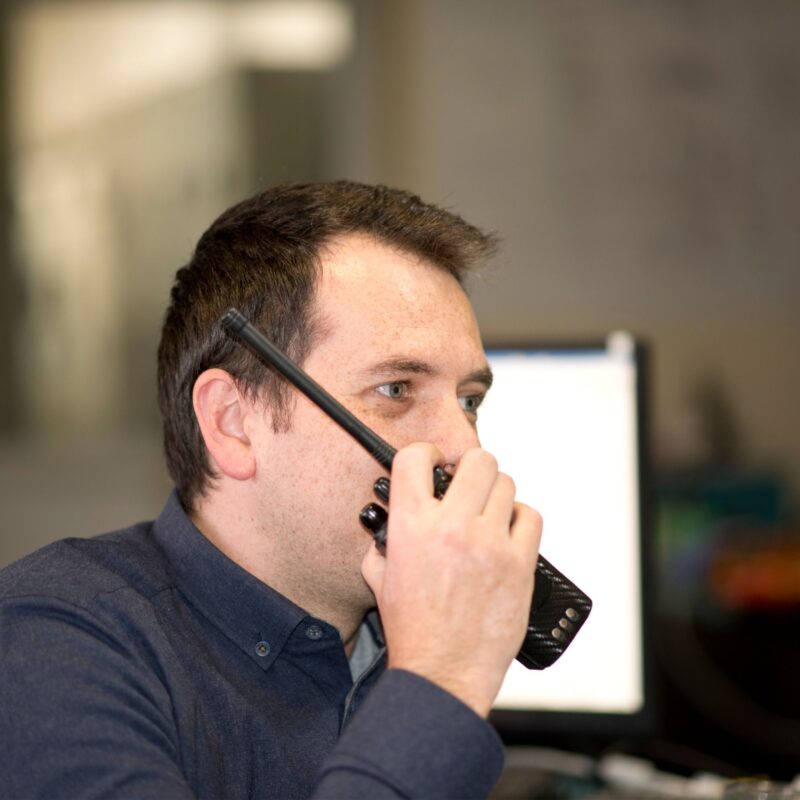 man using 2 way radio