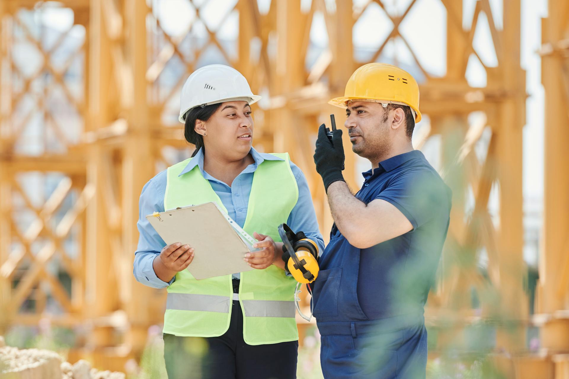 Construction workers using 2 way radio